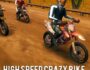 Futuristic high-speed motorcycle racing on a neon-lit highway, featuring an extreme bike rider leaning into a sharp turn with motion blur effects.