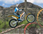 Trials Ride 2 promotional cover art featuring a dynamic motorcyclist navigating rocky terrain on an orange dirt bike under a clear blue sky, capturing the thrill of motorcycle trial gaming.