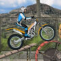 Trials Ride 2 promotional cover art featuring a dynamic motorcyclist navigating rocky terrain on an orange dirt bike under a clear blue sky, capturing the thrill of motorcycle trial gaming.