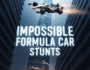 Formula car performing impossible aerial stunt between skyscrapers, Impossible Formula Car Stunts game logo.